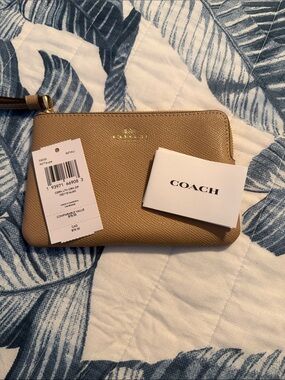 COACH Pebble Leather Wristlet in Light Tan with Gold Hardware